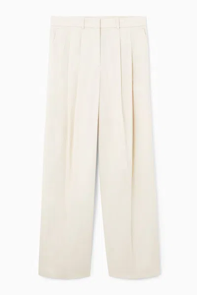 Cos Relaxed Tailored Wide-leg Trousers In Beige