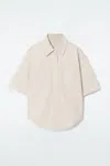 Cos Curved-hem Short-sleeved Denim Shirt In Beige
