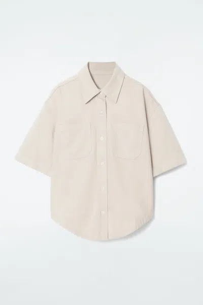 Cos Curved-hem Short-sleeved Denim Shirt In Beige