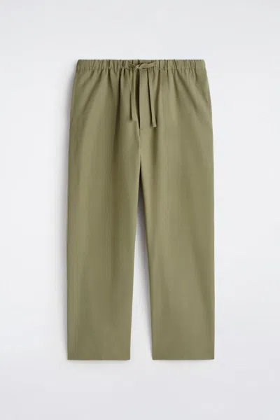 Cos Relaxed-fit Barrel-leg Drawstring Trousers In Green