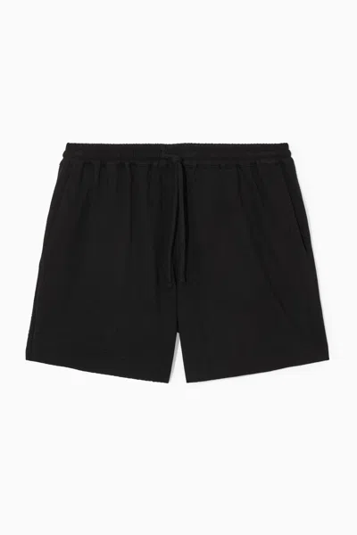 Cos Seersucker Elasticated Shorts In Black