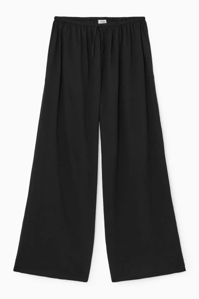 Cos Semi-sheer Drawstring Trousers In Black