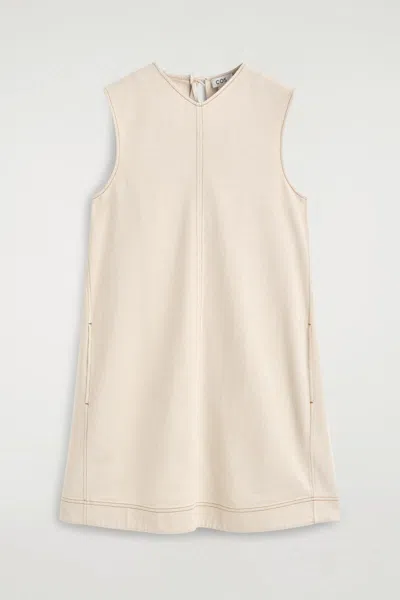 Cos V-neck Open-back Denim Mini Dress In Neutral
