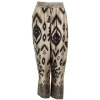 COSTA MANI BORDER TROUSERS IN SAND WITH BLACK PRINT