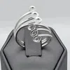 Costello International Women's Triple Curls Wrap Ring In Silver In Silver