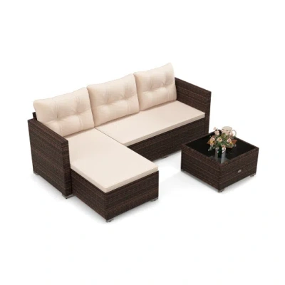 Costway 4 Seats Outdoor Wicker Furniture Set With Tempered Glass Coffee Table And Soft Cushions-beige In Brown