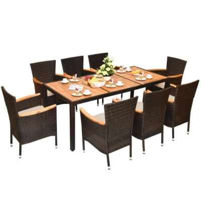 Costway 9 Pieces Rattan Dining Set With Acacia Wood Table And Stackable Cushioned Chairs In Brown