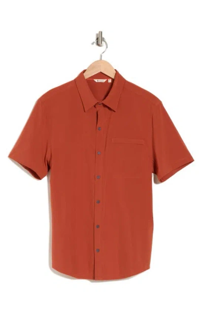 Cotopaxi Cambio Trim Fit Solid Short Sleeve Button-up Shirt In Spice