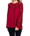 Cotton Bleu Satin Blouse With Laced Neckline In Cranberry In Red