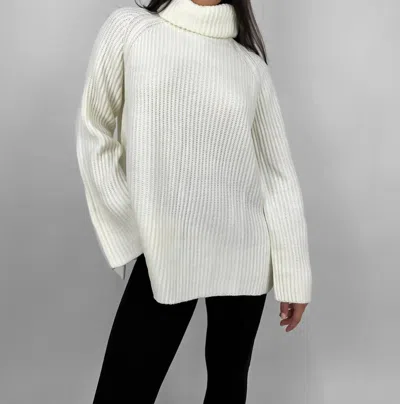 Cotton Candy Side Slit Turtleneck Sweater In Cream In White