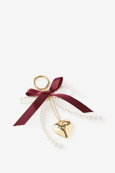 Cotton On Bag Charm In Pearl Bow Burgundy Gold Heart