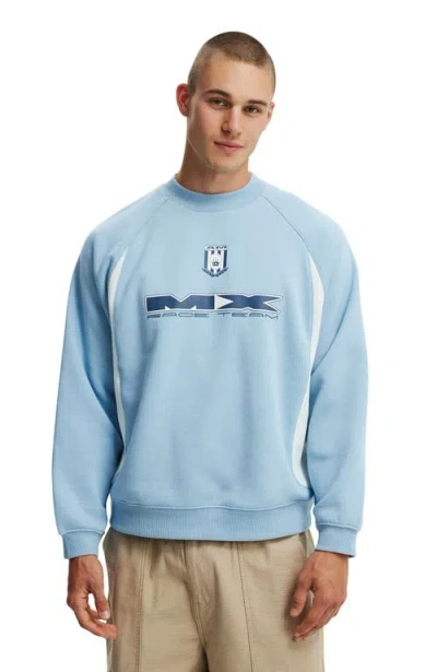 COTTON ON BOX FIT GRAPHIC CREW SWEATER