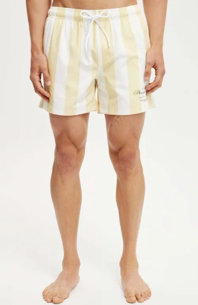 Shop Cotton On Stretch Swim Trunks In Lemon Stripe