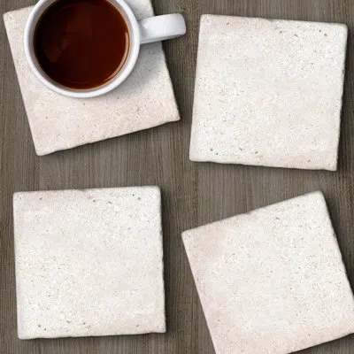 Counterart Natural Shell 4 Pack Stone Absorbent Stone Coasters With Protective Cork Backing In Ivory