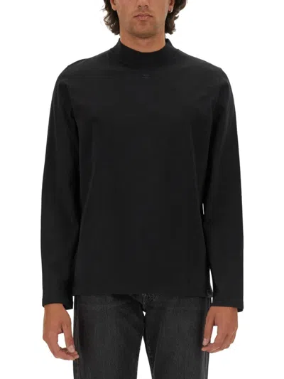 COURRÈGES BLACK T-SHIRT WITH SUBTLE LOGO