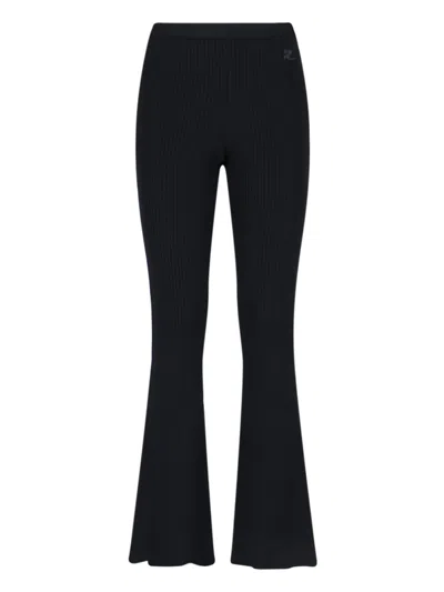 COURRÈGES COURRÈGES FLARED BLACK TROUSERS WITH RIBBED TEXTURE