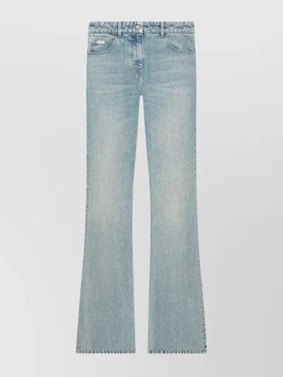 COURRÈGES FLARED LIGHT WASH FIVE-POCKET TROUSERS