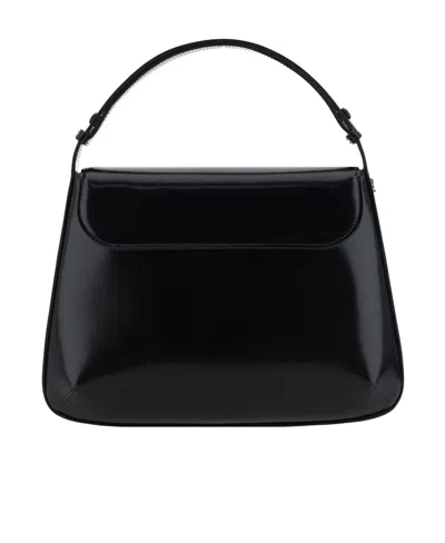 Courrèges Flip Handbag In Black