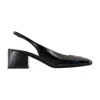 Courrèges Heritage Vinyl Slingbacks In Black