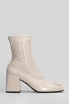 Courrèges High Heels Ankle Boots In Beige Leather In Neutral