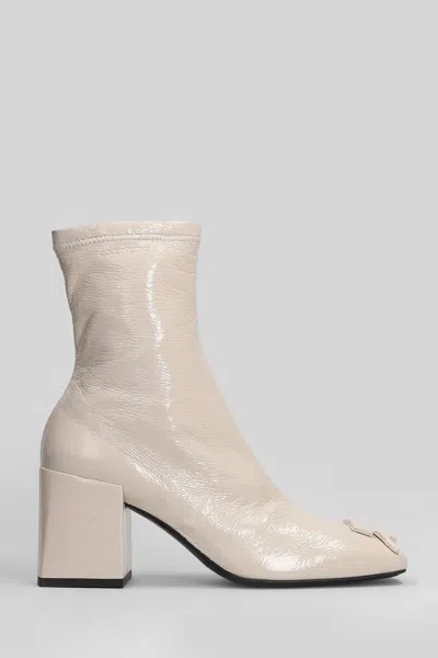 Courrèges High Heels Ankle Boots In Beige Leather In Neutral