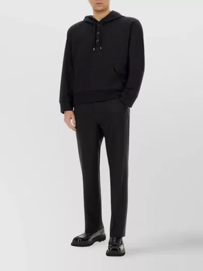 Courrèges Hooded Sweater With Front Pocket And Button Detail In Black