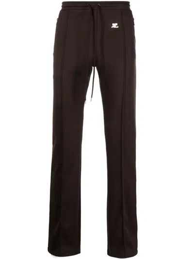 Courrèges Logo-patch Detail Trousers In Brown