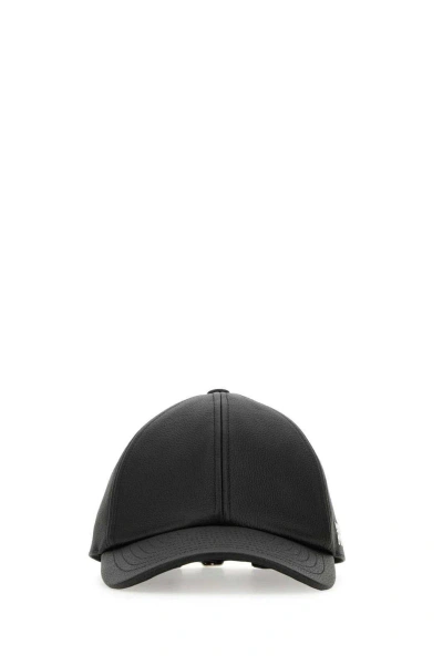 Courrèges Logo Embroidered Baseball Cap In Black