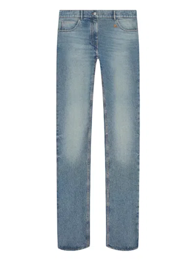 Courrèges Logo Patch Jeans In Blue