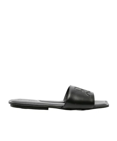 COURRÈGES LOGO-PATCH LEATHER SLIDES