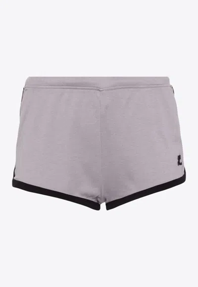 COURRÈGES LOGO PRINT MINI SHORTS