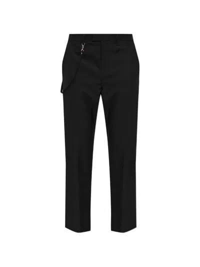 Courrèges Logo-embroidered Tailored Trousers In Black
