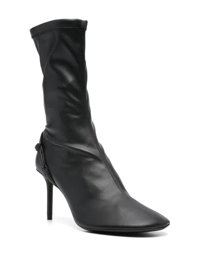 Courrèges Oblique Strap Ankle Boots In Black