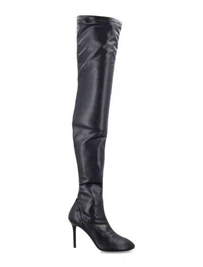 COURRÈGES OBLIQUE STRETCH THIGH BOOTS