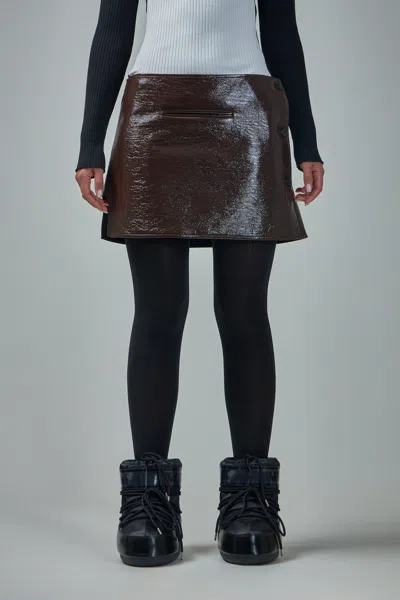 COURRÈGES OBLIQUE VINYL MINI SKIRT