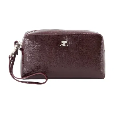 Courrèges Courreges Pebbled Leather Wristlet Wallet In Burgundy
