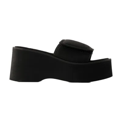COURRÈGES PLATFORM SLIDES