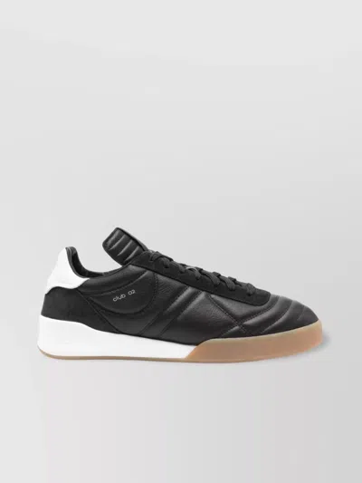 COURRÈGES QUILTED LOW TOP SNEAKERS