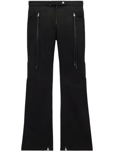 Courrèges Racer Flared Cotton Trousers In 黑色