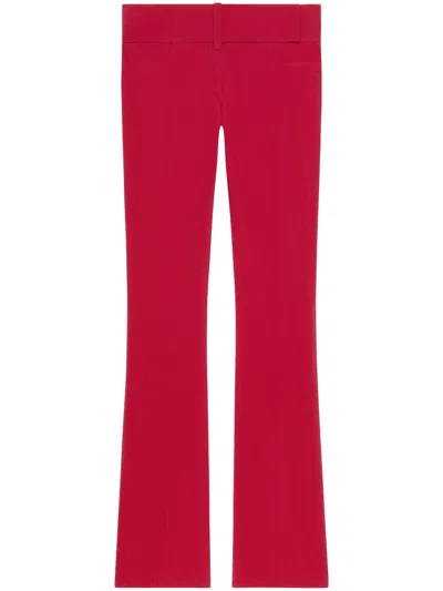 COURRÈGES RED BELTED FLARED PANTS