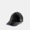 Courrèges Reedition Vinyl Cap In Black