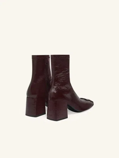 Courrèges Reedition Crinkled Vinyl Ankle Boots In Burgundy