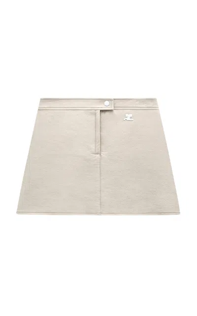 COURRÈGES REEDITION VINYL MINI SKIRT