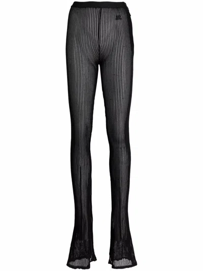 Courrèges Sheer Embroidered-logo Trousers In Black