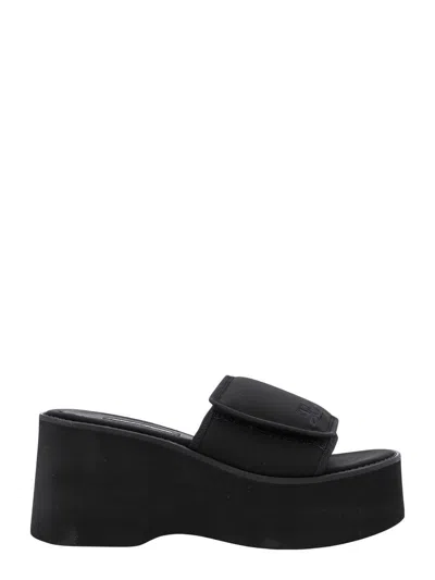サンダル・ミュール Courreges Black stretch polyester blend Scusa Wave slippers Courrèges Stretch Polyester Blend Scusa Wave Platform