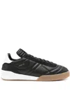 Courrèges Quilted Low Top Sneakers In Black