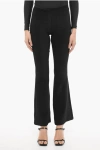 COURRÈGES SOLID COLOR FLARED PANTS WITH SIDE ZIP