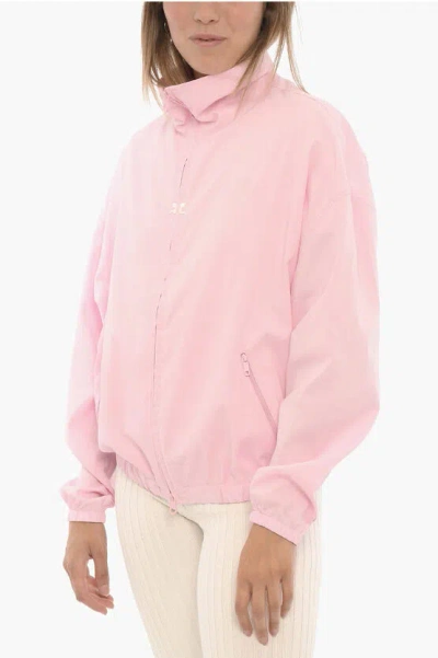 Courrèges Solid Color Windbreaker Jacket With Embroidered Logo In Pink