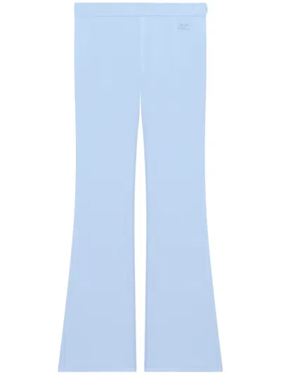Courrèges Tech Jersey Flared Trousers In Blue