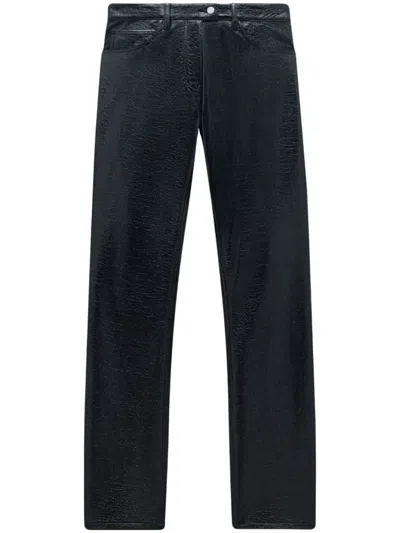 Courrèges Coated Cotton-blend Slim-leg Trousers In Black